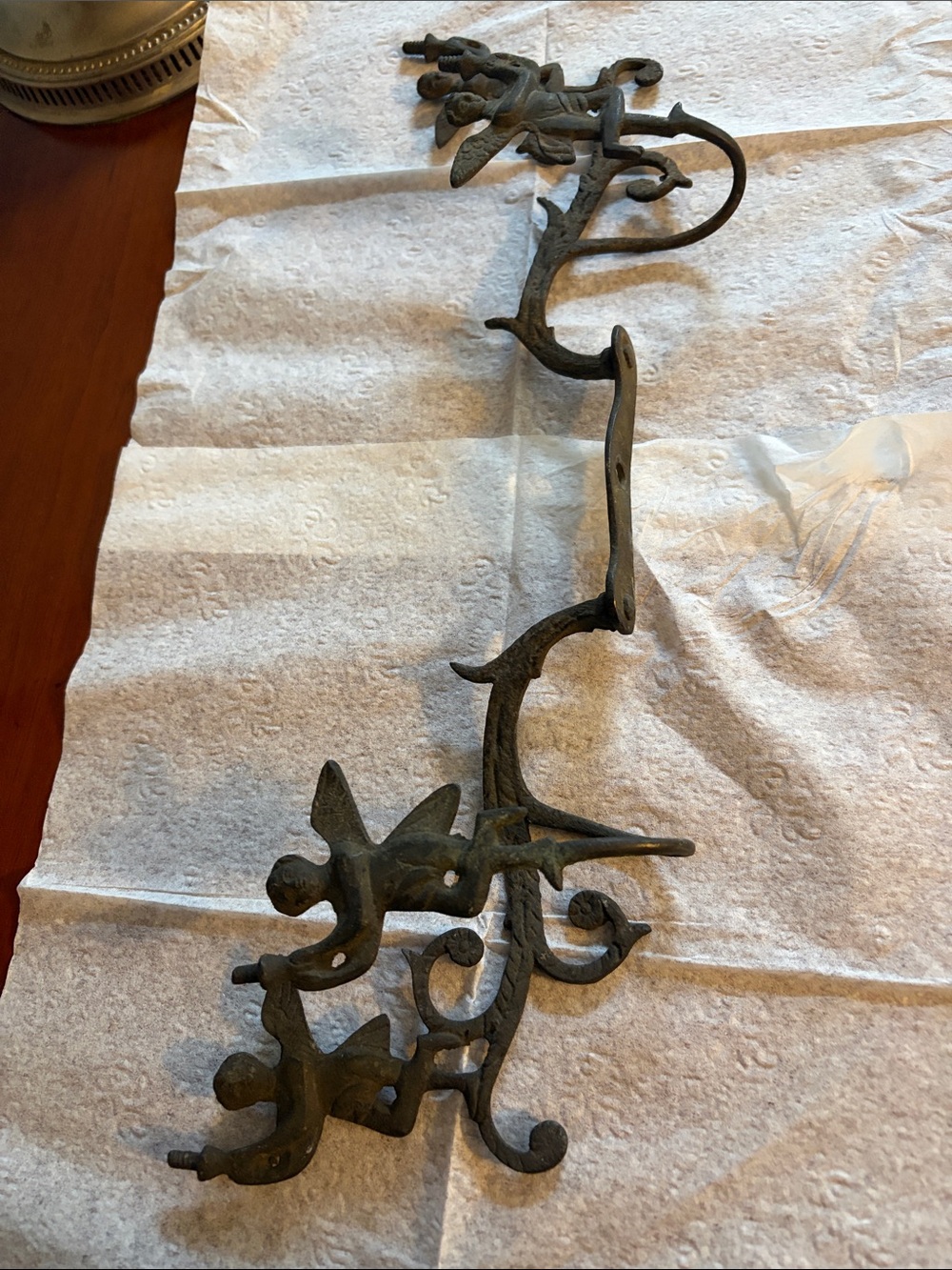 Cast iron coat rack with Cherubs. Mid century or earlier?
